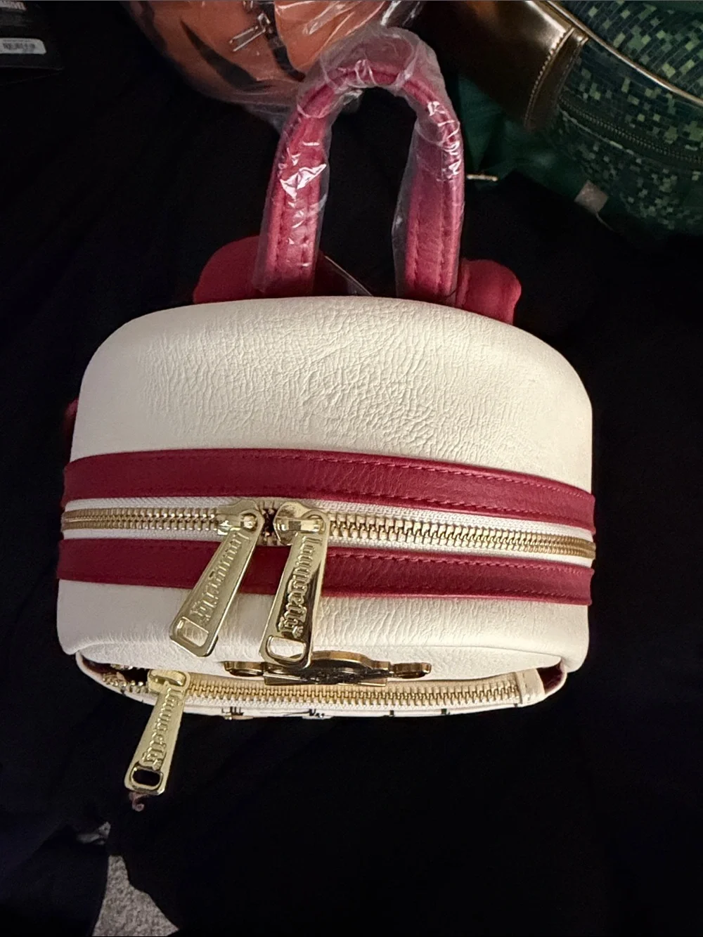 Loungefly White Pirates of the Caribbean Backpack with Red Accents
